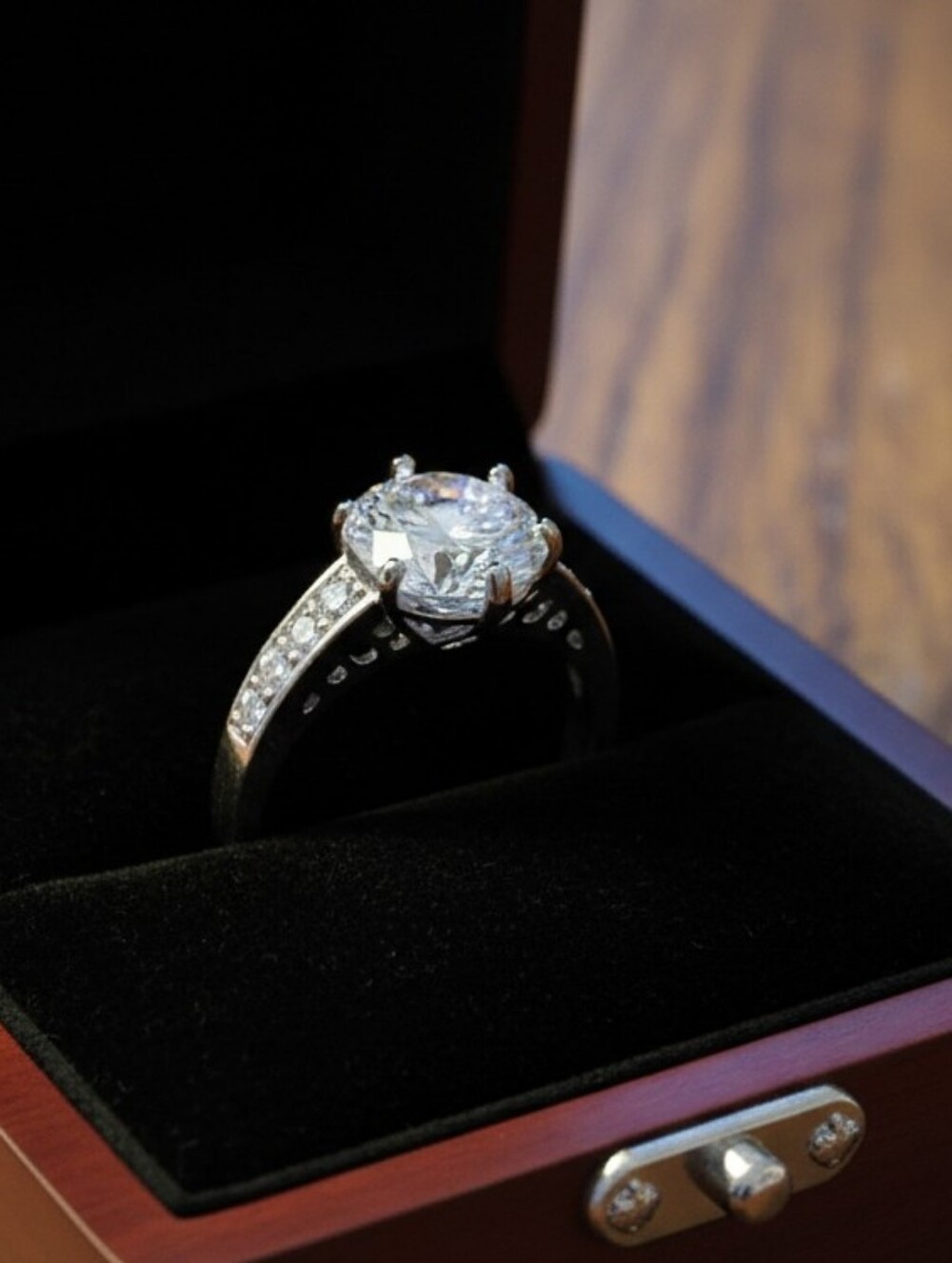 Classic White Solitaire Engagement Ring with Side Stones